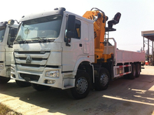 SINOTRUK 8X4 HOWO 25Ton 30Tons Cargo Truck Mounted Foldable Arm Crane