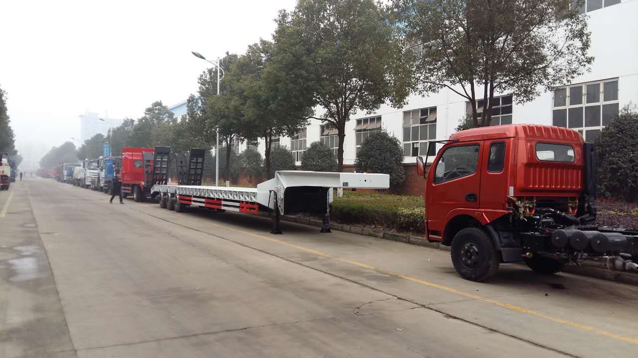 China 3 Axles Front Loading Hydraulic Gooseneck Detachable 100tons Low Bed Semi Trailer /lowboy Trailer for Sale